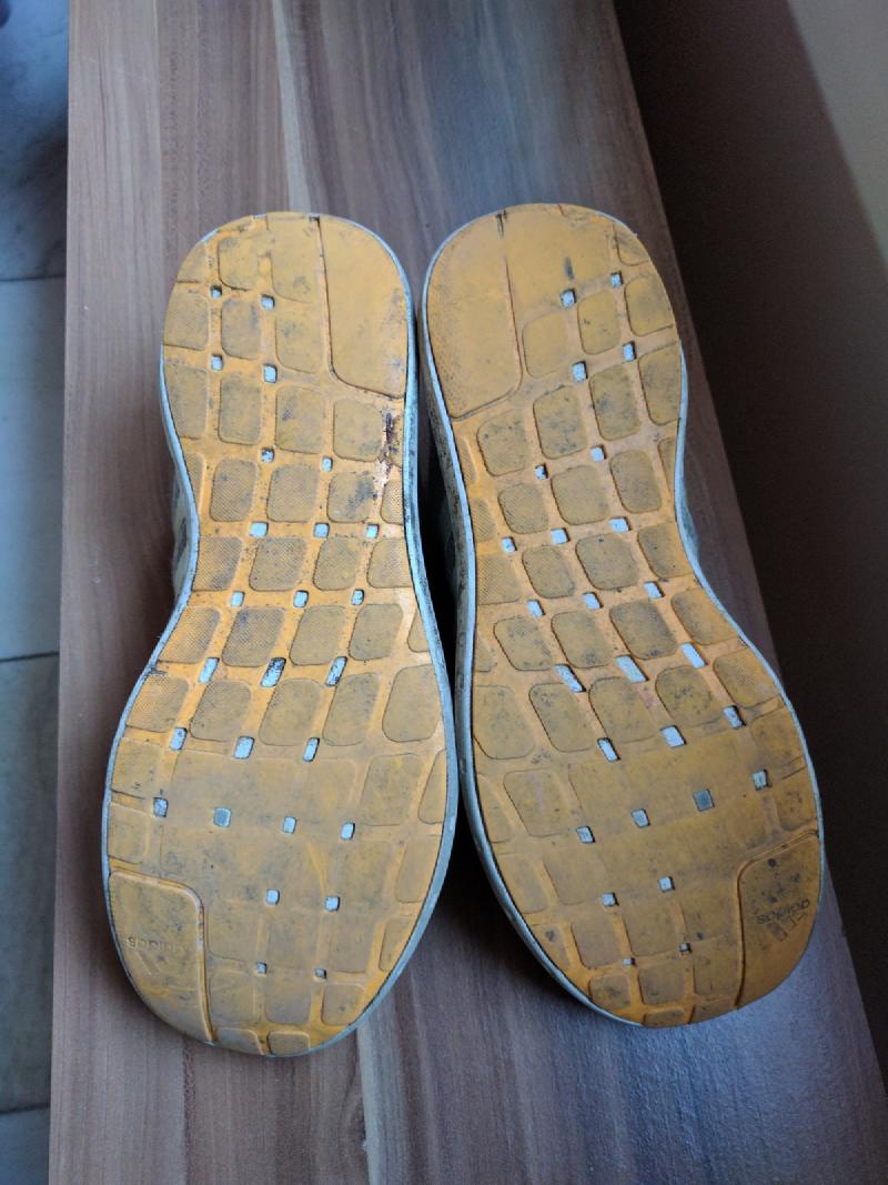 Another view of the worn tread on Matt's old travel shoes